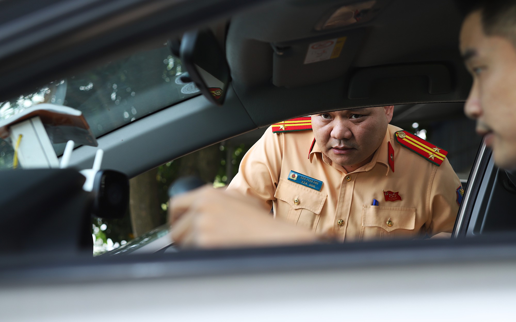 Công khai mức phí thi và cấp đổi giấy phép lái xe, phát hiện thu thêm báo ngay CSGT- Ảnh 1.