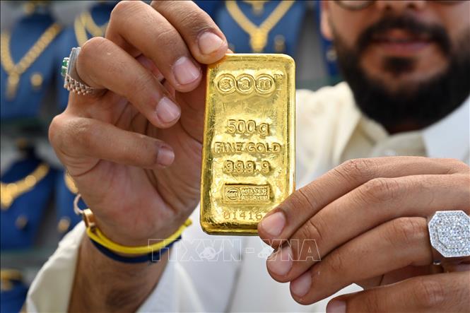 Vàng và bạc chịu áp lực bán mạnh khi các quỹ tái cân bằng hoạt động- Ảnh 1.