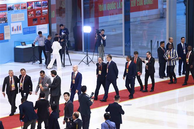 Đại biểu đến dự khai mạc Đại hội XIV của Đảng- Ảnh 11.