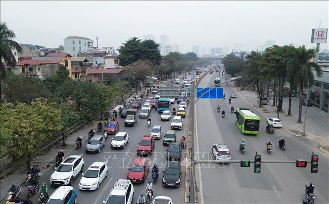 Người dân ùn ùn trở lại Thủ đô sau kỳ nghỉ Tết Dương lịch- Ảnh 4.