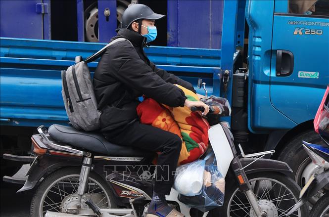 Người dân ùn ùn trở lại Thủ đô sau kỳ nghỉ Tết Dương lịch- Ảnh 9.