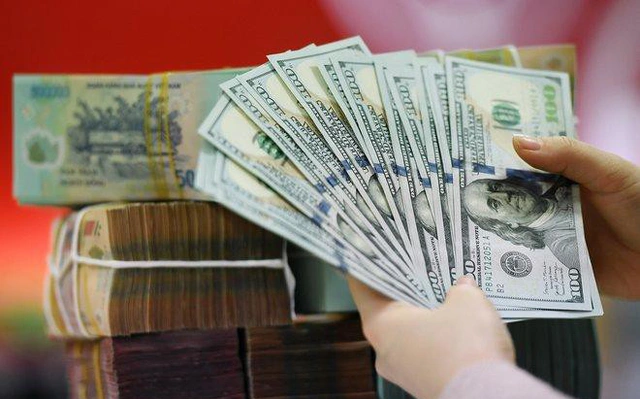 Tỷ giá USD 24/3 tiếp tục leo thang- Ảnh 1. Tỷ giá USD 24/3 tiếp tục leo thang- Ảnh 1.