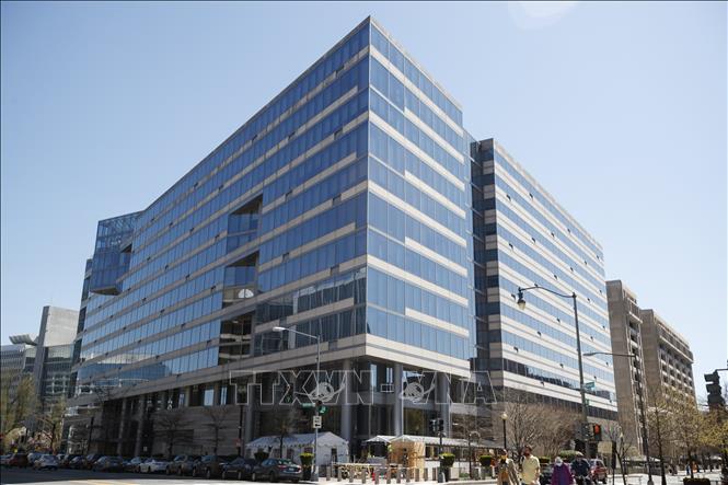 IMF hạ dự báo tăng trưởng toàn cầu năm 2026- Ảnh 1. IMF hạ dự báo tăng trưởng toàn cầu năm 2026- Ảnh 1.