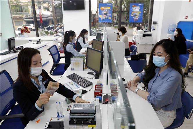 Lãi suất ngân hàng tiếp tục nhích tăng- Ảnh 1.