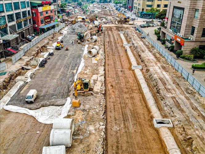 Hà Nội tăng tốc hạ tầng, công trường 'xuyên lễ' không ngừng nghỉ- Ảnh 4.