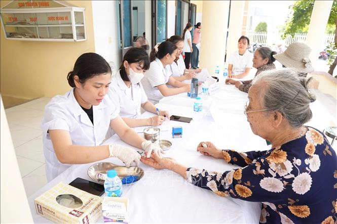 Mở rộng quyền lợi, tăng mức hưởng BHYT từ ngày 1/7/2026- Ảnh 1. Mở rộng quyền lợi, tăng mức hưởng BHYT từ ngày 1/7/2026- Ảnh 1.