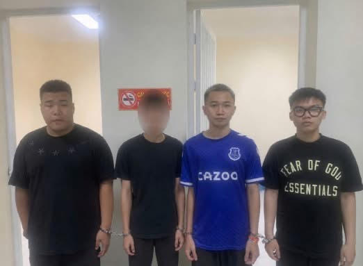 Chơi bi-a ăn tiền tại chung cư, 4 đối tượng bị bắt giữ- Ảnh 1.