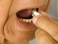 Dùng thuốc đặt trong miệng thế nào? 1