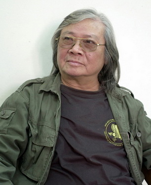 NSND Lê Huy Quang.