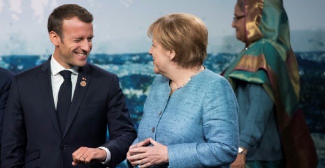 Tổng thống Pháp Emmanual Macron trong một cuộc gặp gỡ với Thủ tướng Đức Angela Merkel