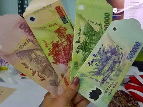 Các bao lì xì in hình tiền giống như thật có thể bị phạt rất nặng.