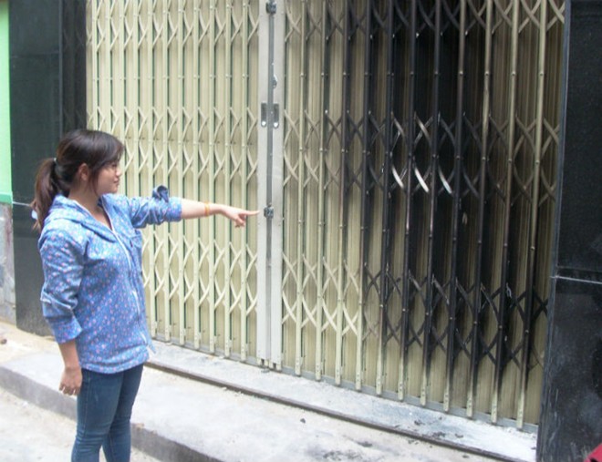 Ngồi vào chậu xăng tự thiêu vì tranh giành 2 tấc đất 1