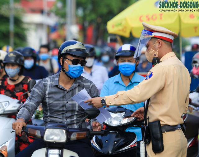 Từ sáng 8/9, người ra vào vùng 1 ở Hà Nội bắt buộc phải có giấy đi đường mới - Ảnh 2.