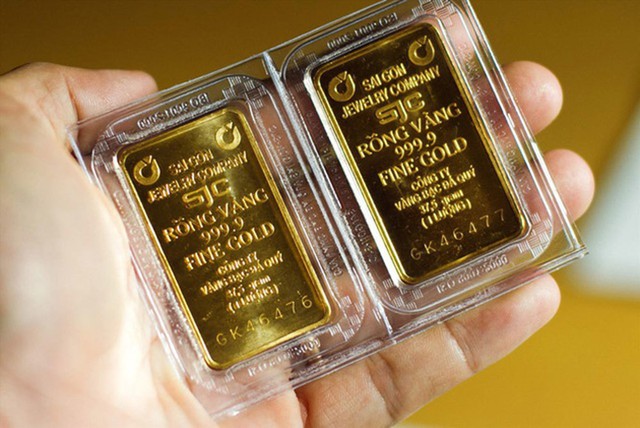 Giá vàng SJC tăng thêm 200.000 đồng, đạt xấp xỉ gần 70 triệu đồng một lượng - Ảnh 1.