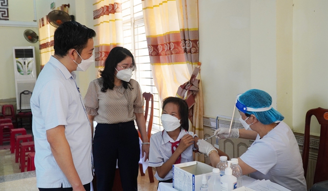 Trẻ 5 đến dưới 12 tuổi tại Quảng Bình được tiêm vaccine COVID-19 mũi 1 - Ảnh 9.