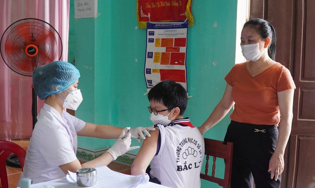 Trẻ 5 đến dưới 12 tuổi tại Quảng Bình được tiêm vaccine COVID-19 mũi 1 - Ảnh 8.