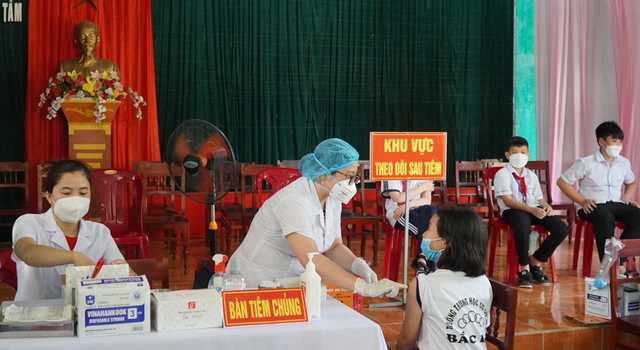 Trẻ 5 đến dưới 12 tuổi tại Quảng Bình được tiêm vaccine COVID-19 mũi 1 - Ảnh 7.