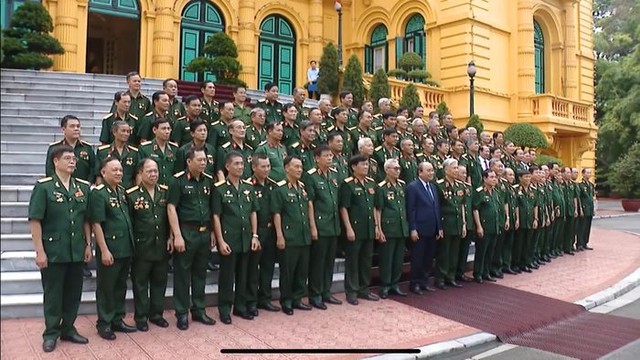 Chủ tịch nước Nguyễn Xuân Phúc tiếp đại biểu cựu chiến binh Mặt trận Vị Xuyên - Hà Tuyên - Ảnh 4.