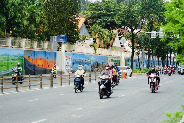 Ngắm con đường bích họa sống động, đẹp nhất Sài Gòn - Ảnh 1.
