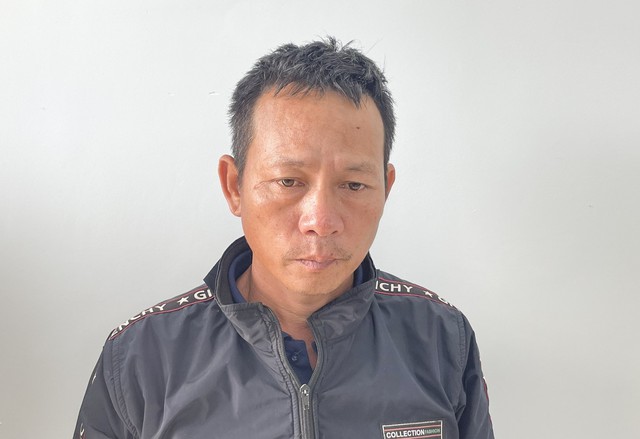 Ông Trương Đình Nhạt - nghi phạm đánh shipper gãy hai tay ở Quảng Ngãi - bị bắt khẩn cấp. Ảnh: CACC.