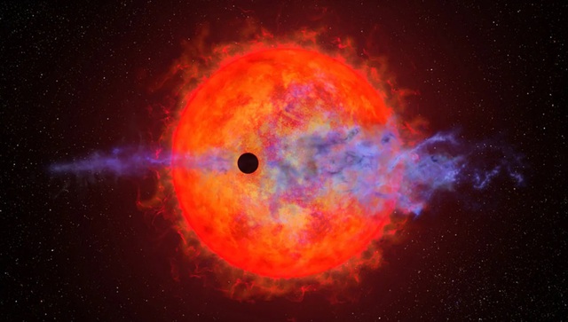 Kính viễn vọng Hubble ghi lại khoảnh khắc bầu khí quyển một hành tinh bị thổi bay - Ảnh 2.