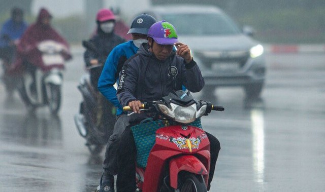 Miền Bắc mưa phùn, ban ngày nhiệt cao đến 26 độ- Ảnh 2. Miền Bắc mưa phùn, ban ngày nhiệt cao đến 26 độ- Ảnh 2.