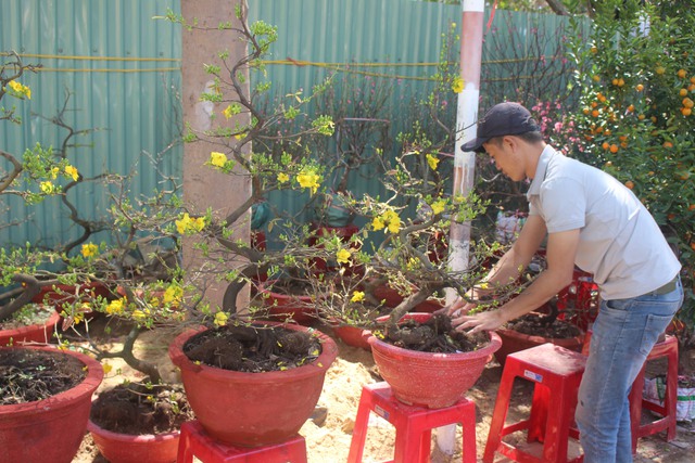 Tâm sự những người làm việc đến 30 Tết- Ảnh 1.