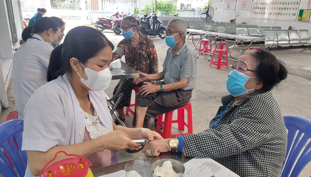 'Làn gió mới' trạm y tế ở TPHCM: Khi bác sĩ mang niềm tin đến với người dân- Ảnh 1. 'Làn gió mới' trạm y tế ở TPHCM: Khi bác sĩ mang niềm tin đến với người dân- Ảnh 1.