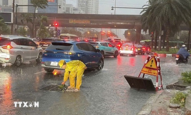Hà Nội kích hoạt các biện pháp tiêu thoát nước, phòng chống úng ngập- Ảnh 1.