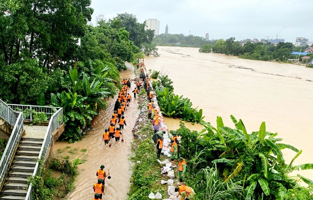 Ứng phó với lũ đặc biệt lớn trên sông Cầu và sông Thương- Ảnh 2. Ứng phó với lũ đặc biệt lớn trên sông Cầu và sông Thương- Ảnh 2.