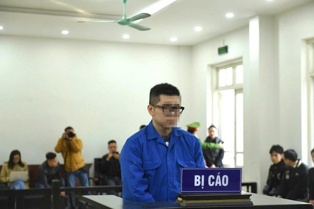 Hoãn phiên tòa xét xử nam thanh niên đánh phụ nữ ở chung cư Hà Nội - Ảnh 2.