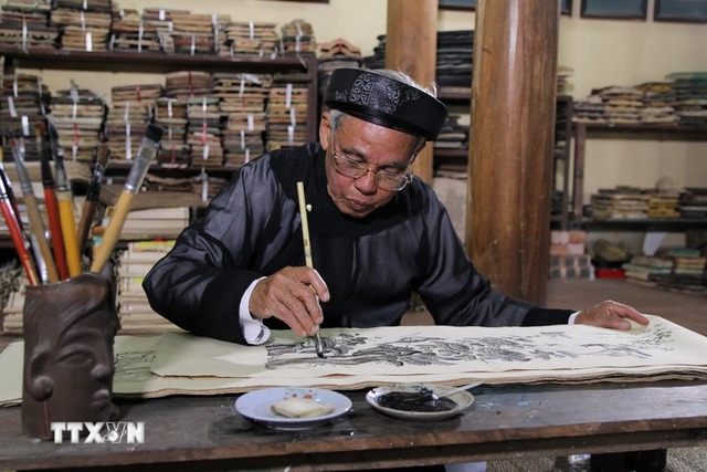 UNESCO ghi danh Nghề làm tranh Đông Hồ vào Danh sách Di sản cần bảo vệ khẩn cấp- Ảnh 1. UNESCO ghi danh Nghề làm tranh Đông Hồ vào Danh sách Di sản cần bảo vệ khẩn cấp- Ảnh 1.