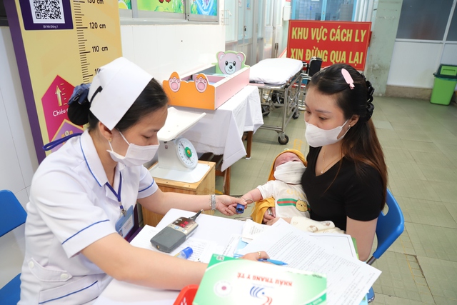 TPHCM tiến tới công bố hết dịch sởi trên toàn thành phố- Ảnh 1.