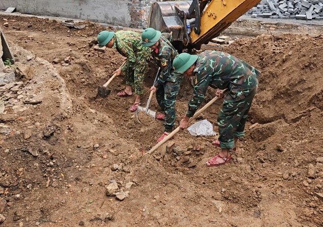 Quy tập hài cốt liệt sĩ tại di tích gắn liền với cuộc chiến đấu bảo vệ Thành cổ - Ảnh 1.