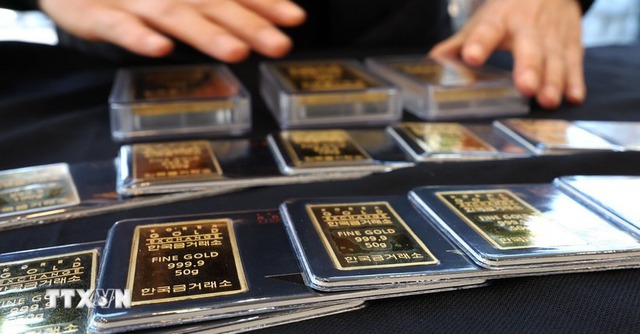 Giá vàng vượt mốc 5.100 USD mỗi ounce, giá bạc và bạch kim đồng loạt lập đỉnh- Ảnh 1.