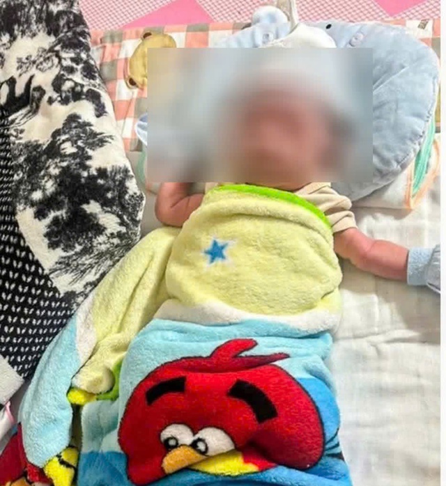 Tìm cha mẹ cho bé trai bị bỏ rơi gần nghĩa trang- Ảnh 1.