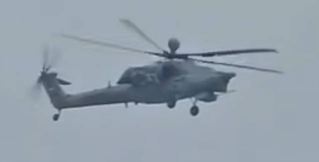 Trực thăng Mi-28 Nga xuất hiện trên bầu trời Iran- Ảnh 1. Trực thăng Mi-28 Nga xuất hiện trên bầu trời Iran- Ảnh 1.