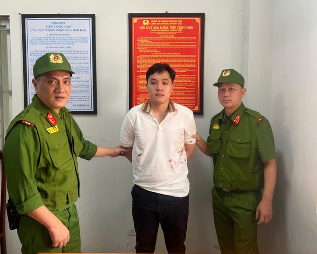 Công an Hà Nội thông tin vụ bắt giữ đối tượng tấn công tài xế xe ghép tại Linh Đàm- Ảnh 1.