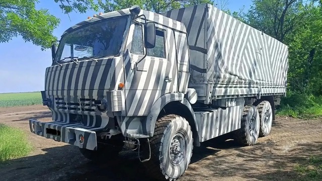 Nga tung 'chiêu lạ' biến xe tải thành cơn ác mộng với UAV Ukraine- Ảnh 1. Nga tung 'chiêu lạ' biến xe tải thành cơn ác mộng với UAV Ukraine- Ảnh 1.