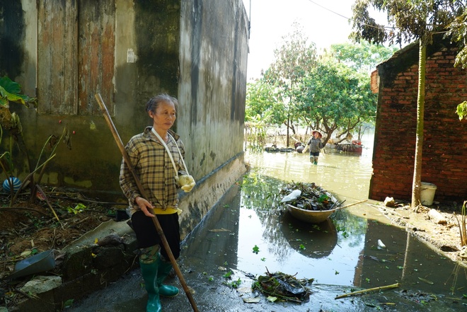 Sau lũ, người dân Nam Phương Tiến gấp rút tổng vệ sinh để sớm ổn định cuộc sống- Ảnh 9.