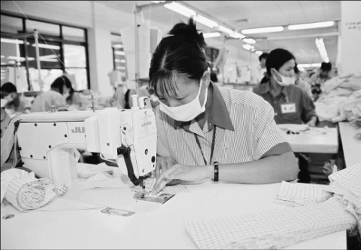 
	Người lao động ai cũng trong tâm trạng mong chờ thưởng Tết. Ảnh: Trần Minh