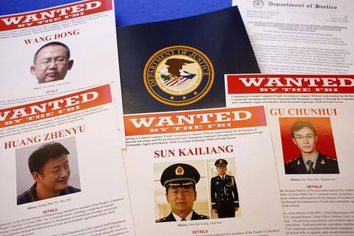 Photo: The U.S. Justice Department announced charges against five individuals in the Chinese military, accusing them of hacking U.S. companies for trade secrets. http://on.wsj.com/1mNGdQ5 Pictured: FBI posters related to the case (Credit: AP)