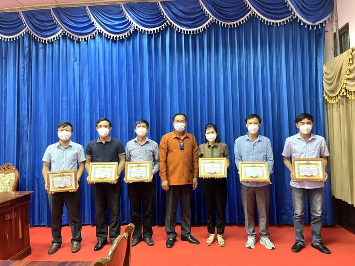 Hoàn thành nhiệm vụ hỗ trợ Lào chống dịch, đoàn công tác của tỉnh Quảng Bình về nước - Ảnh 3.
