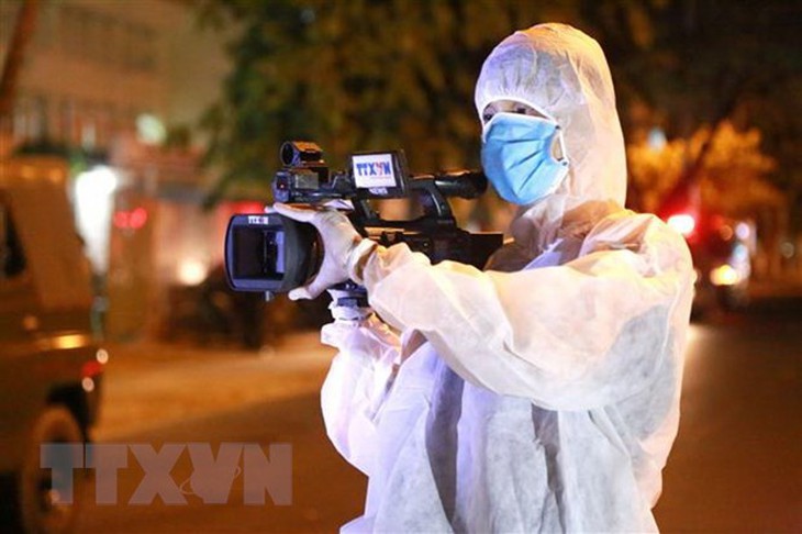 ttxvn_quay_phim_vnews.jpeg ttxvn_quay_phim_vnews.jpeg