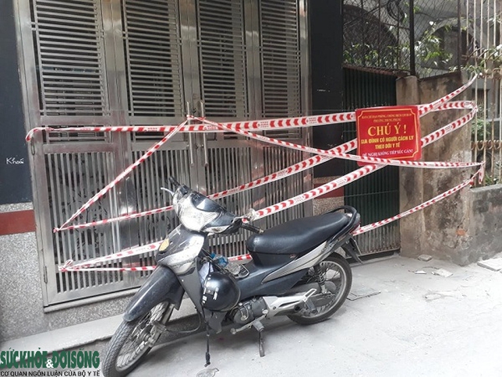 Điều trị F0 tại nhà, người dân hợp tác với y tế cơ sở - Ảnh 2.