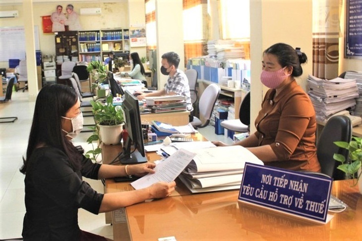 Tiếp tục giảm có 37 khoản phí, lệ phí đến giữa năm 2022 cho những đối tượng bị ảnh hưởng bởi COVID-19 - Ảnh 1.