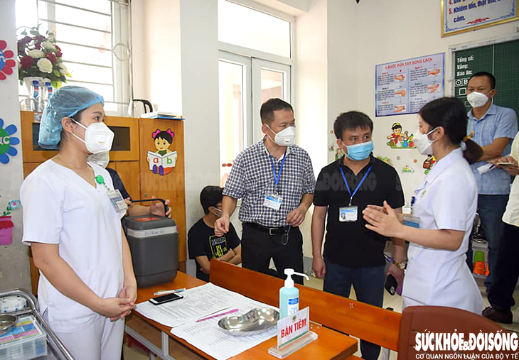 Nghệ An triển khai chiến dịch tiêm vắc xin phòng COVID-19 đợt 4 - Ảnh 1.