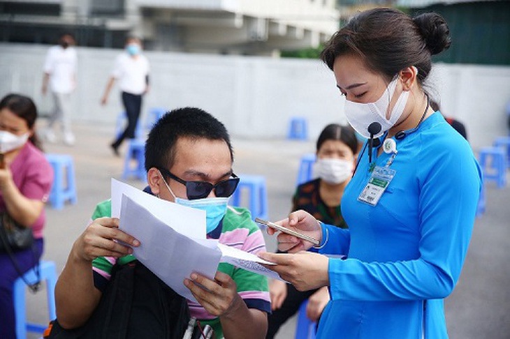 Người khuyết tật và yếu thế được tiêm vắc xin phòng COVID-19 - Ảnh 2.