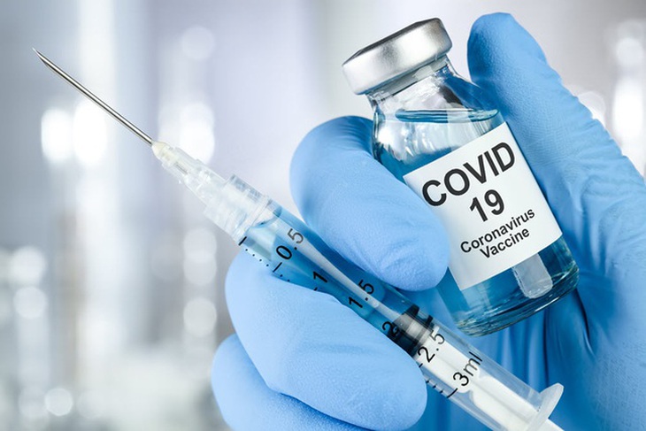 Bộ Y tế tiếp tục yêu cầu "nghiêm cấm thu tiền từ" tiêm vaccine COVID-19 - Ảnh 1.