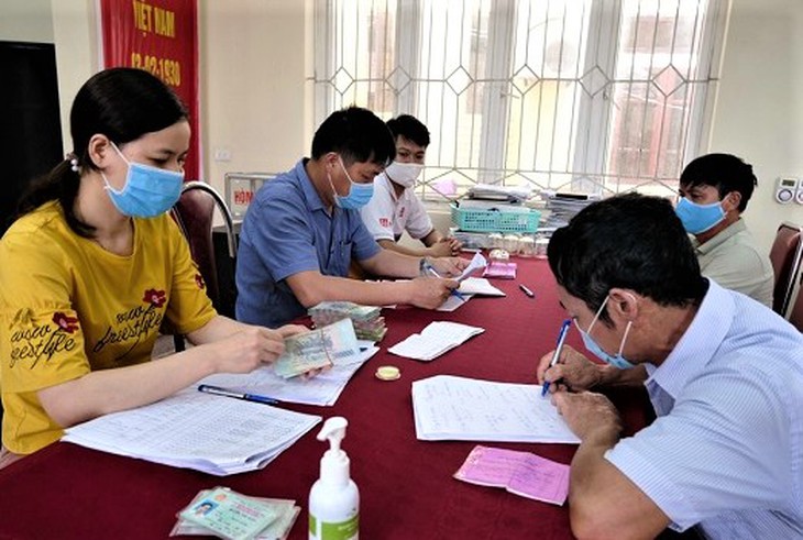 Hà Nội: Gần 208 tỷ đồng hỗ trợ cho người lao động theo Nghị quyết 68 - Ảnh 1. Hà Nội: Gần 208 tỷ đồng hỗ trợ cho người lao động theo Nghị quyết 68 - Ảnh 1.